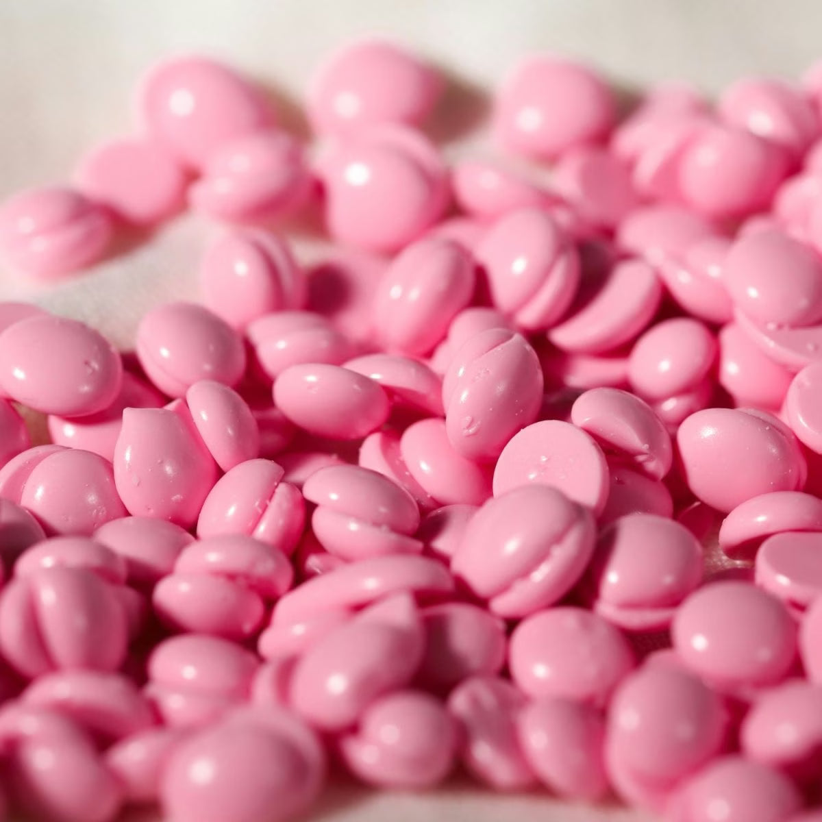 Plumeria pink hard wax beads from Black Coral Wax